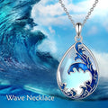 Close-up of a moonstone blue alloy heart pendant necklace on a 20-inch chain.