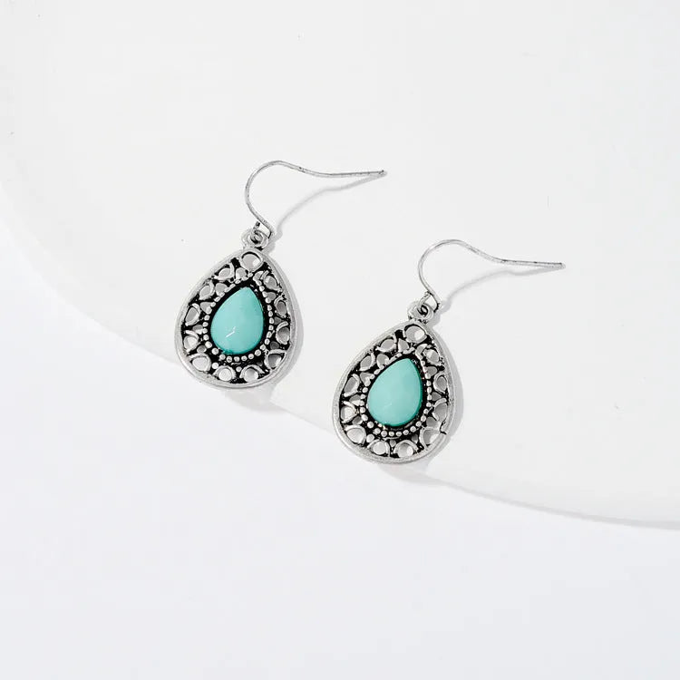Alloy retro drop earrings in triangle and water drop shapes for women's holiday travel style