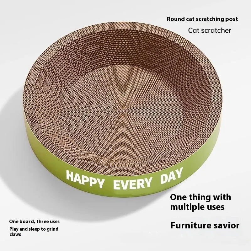 Green round cat nest with a textured sisal scratching board surface, shown in a home setting.