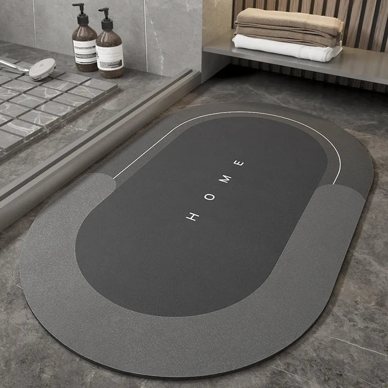 Blended material bathroom floor mat in oval and rectangle shapes on a tiled floor.