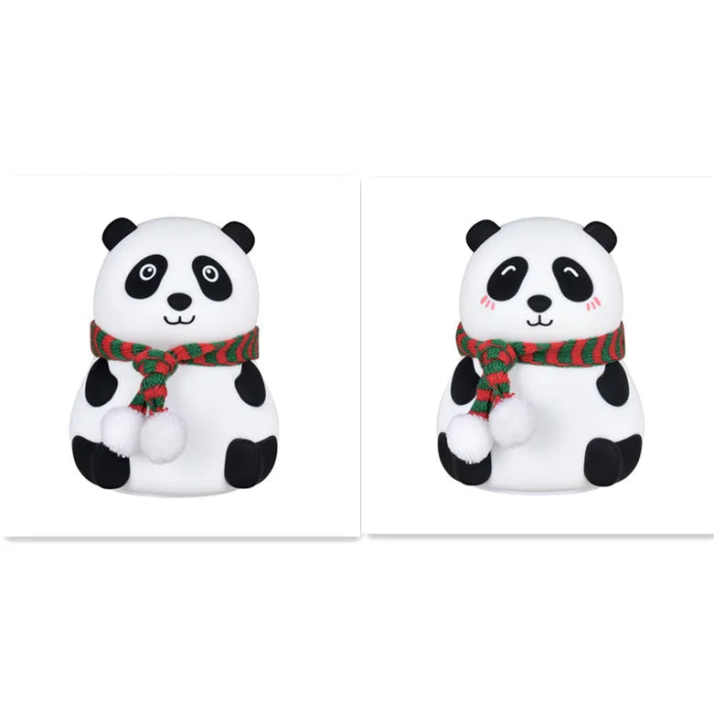 Panda-shaped silicone night light with USB cable on a wooden surface