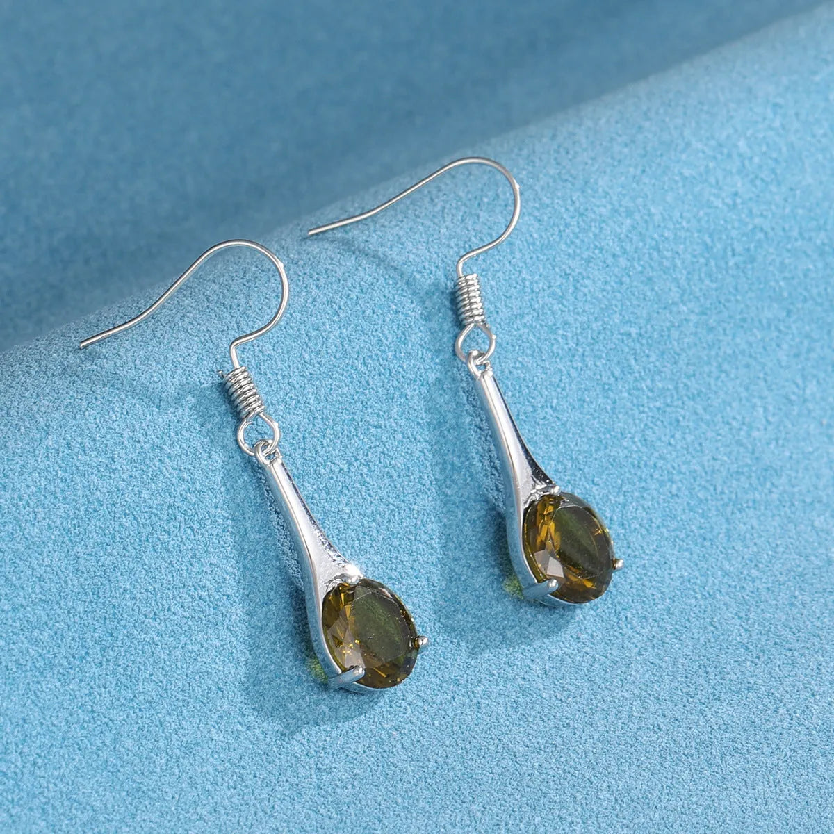 Olive green topaz drop earrings with water drop shape and electroplated alloy construction