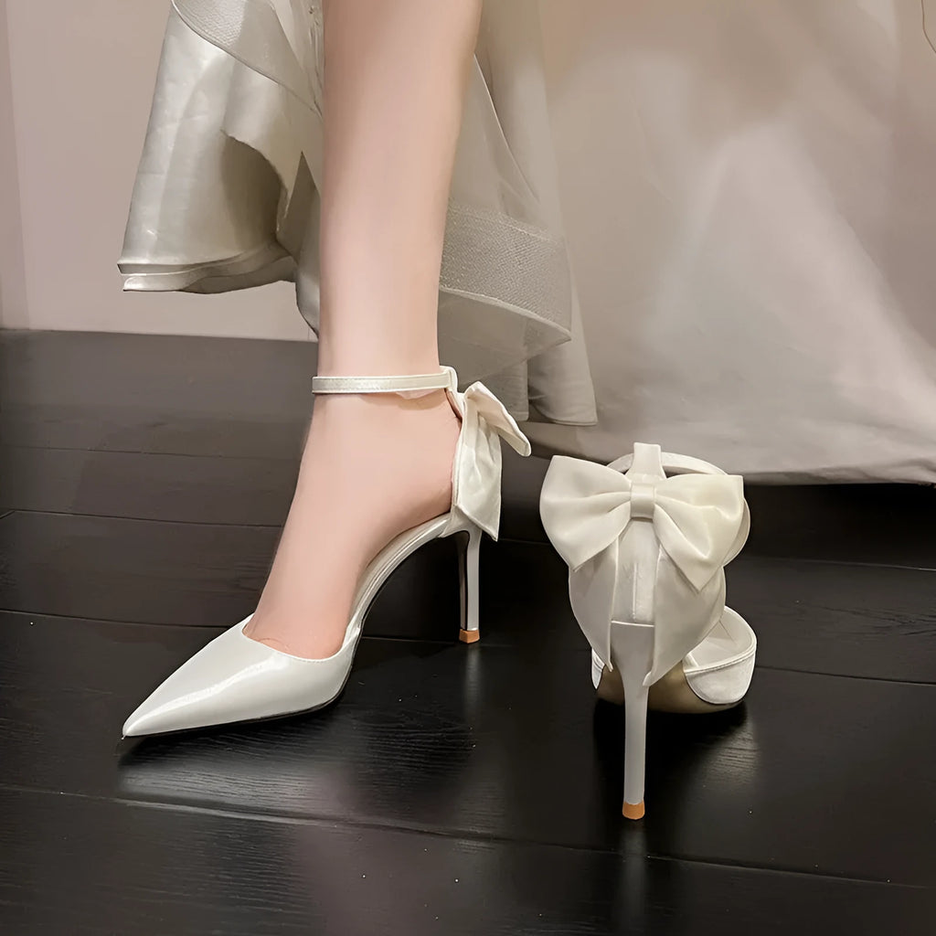 Satin white wedding shoes plus size with ankle buckle closure and 7cm heel on white background