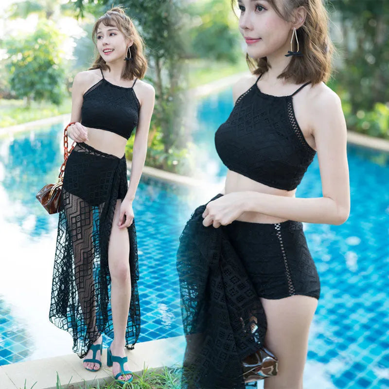 Women's three-piece bikini set in black with high-waist shorts, half-sleeve top, and matching coat