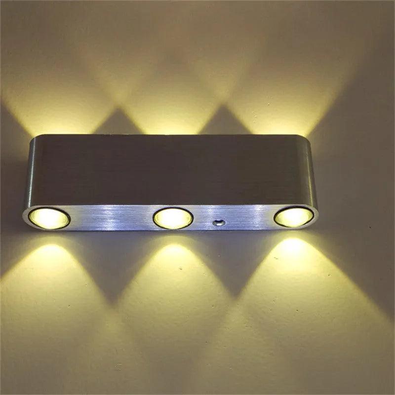 Silver rectangular LED wall lamp with aluminium frame offering seven colour light options