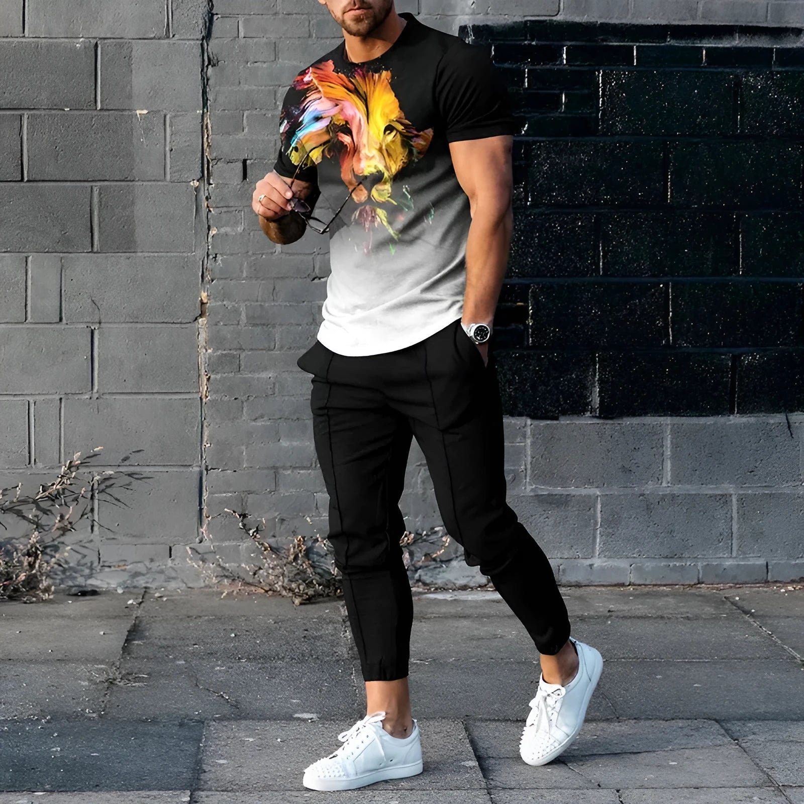 Man wearing a short-sleeved printed polyester tracksuit set for sports.
