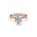 Women's silver electroplated ring in 2 carat gold finish, band style, size 7