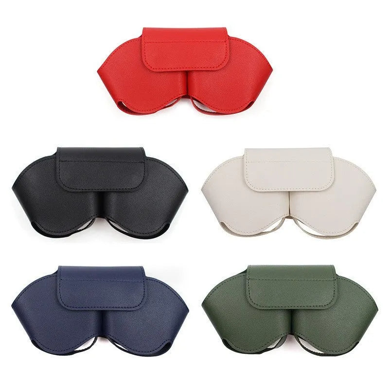 Black PU leather protective case for AirPods Max headphones with the lid open, showing internal sleeves.