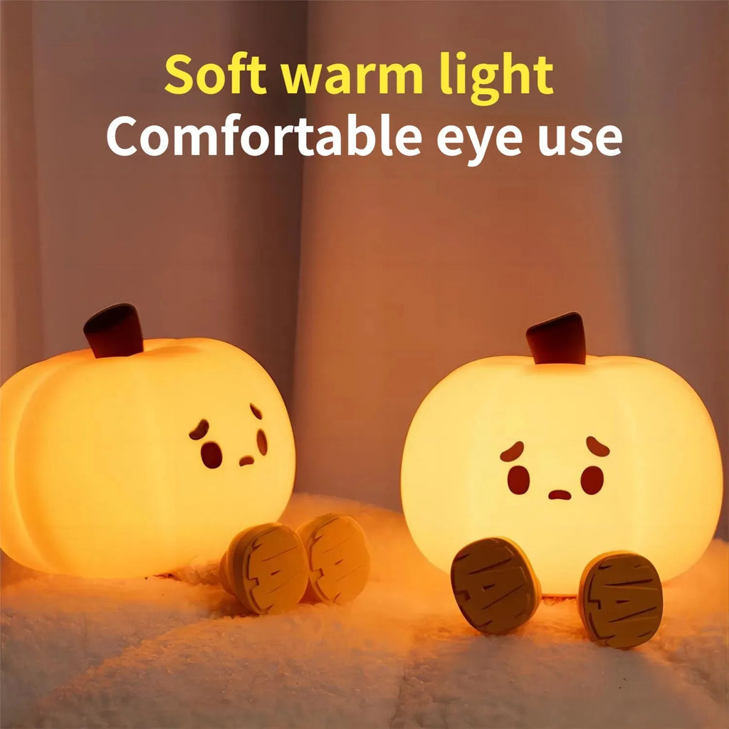 Soft silicone pumpkin-shaped night light with orange colour and touch dimming controls