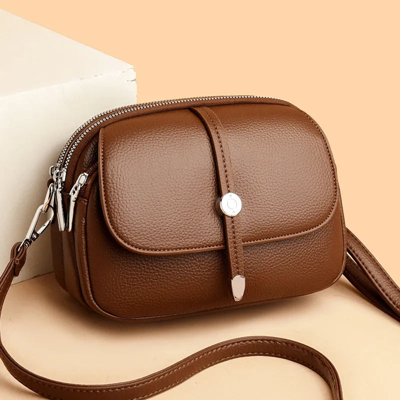 City Simple women's oval crossbody shoulder bag in soft PU leather