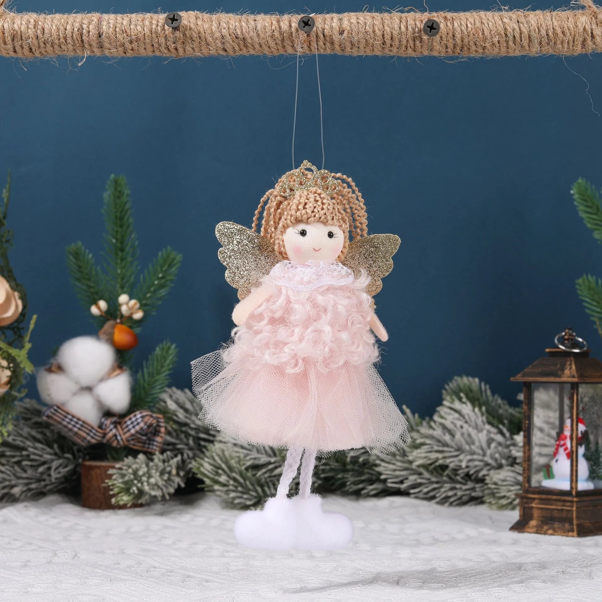 Cartoon-style Christmas angel fabric hair pendant on a girl's high ponytail.