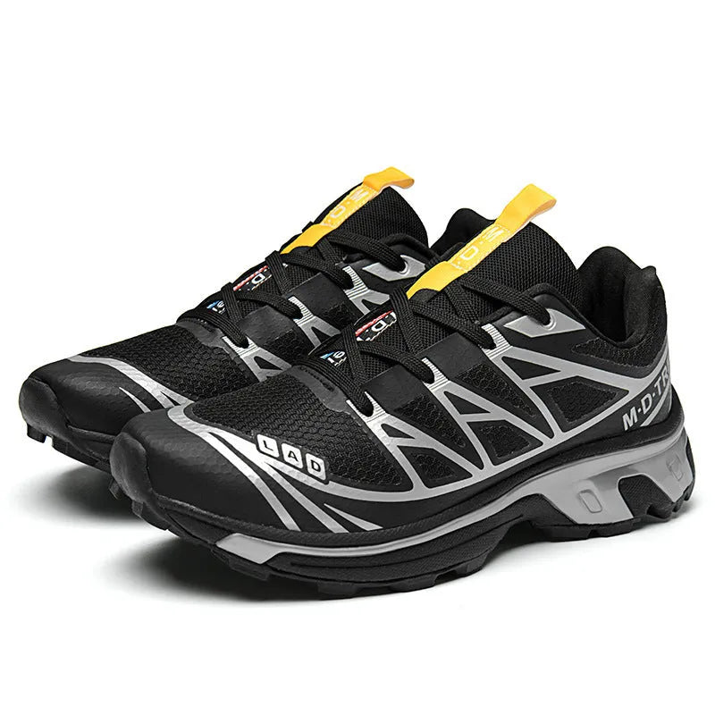 Low-top lace-up hiking shoes in khaki colour with round toe and rubber sole for casual outdoor wear.