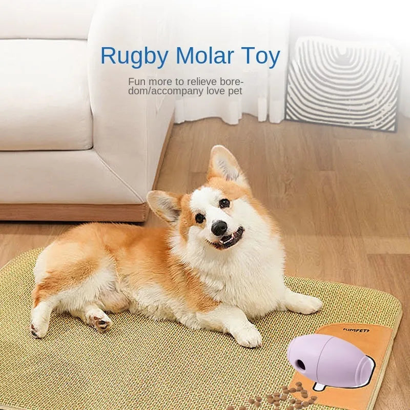 Blue silicone rugby ball dog toy with hollow centre for treat dispensing