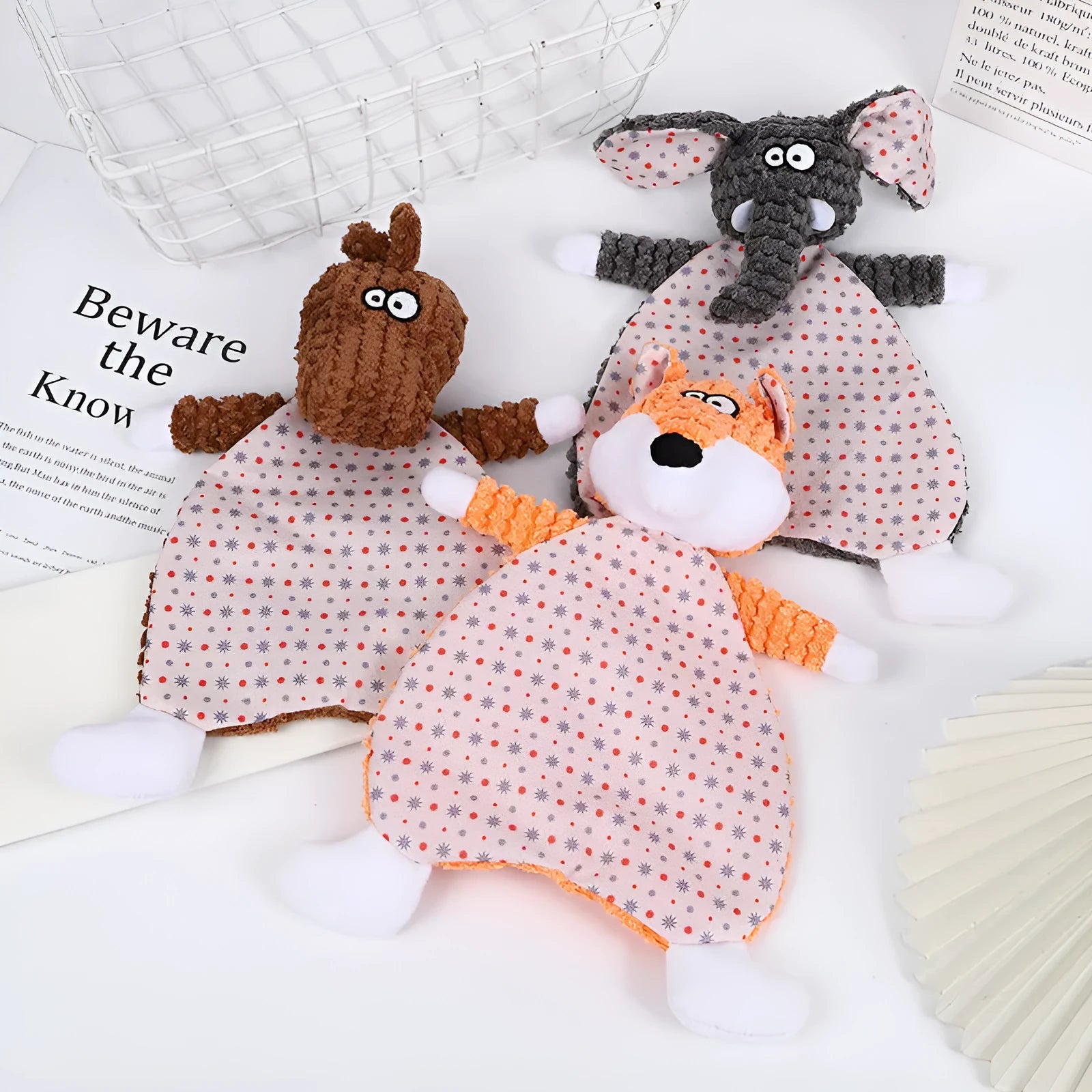 Brown, grey, and orange fox and elephant pet stuffed toys with velvet fabric and sound paper