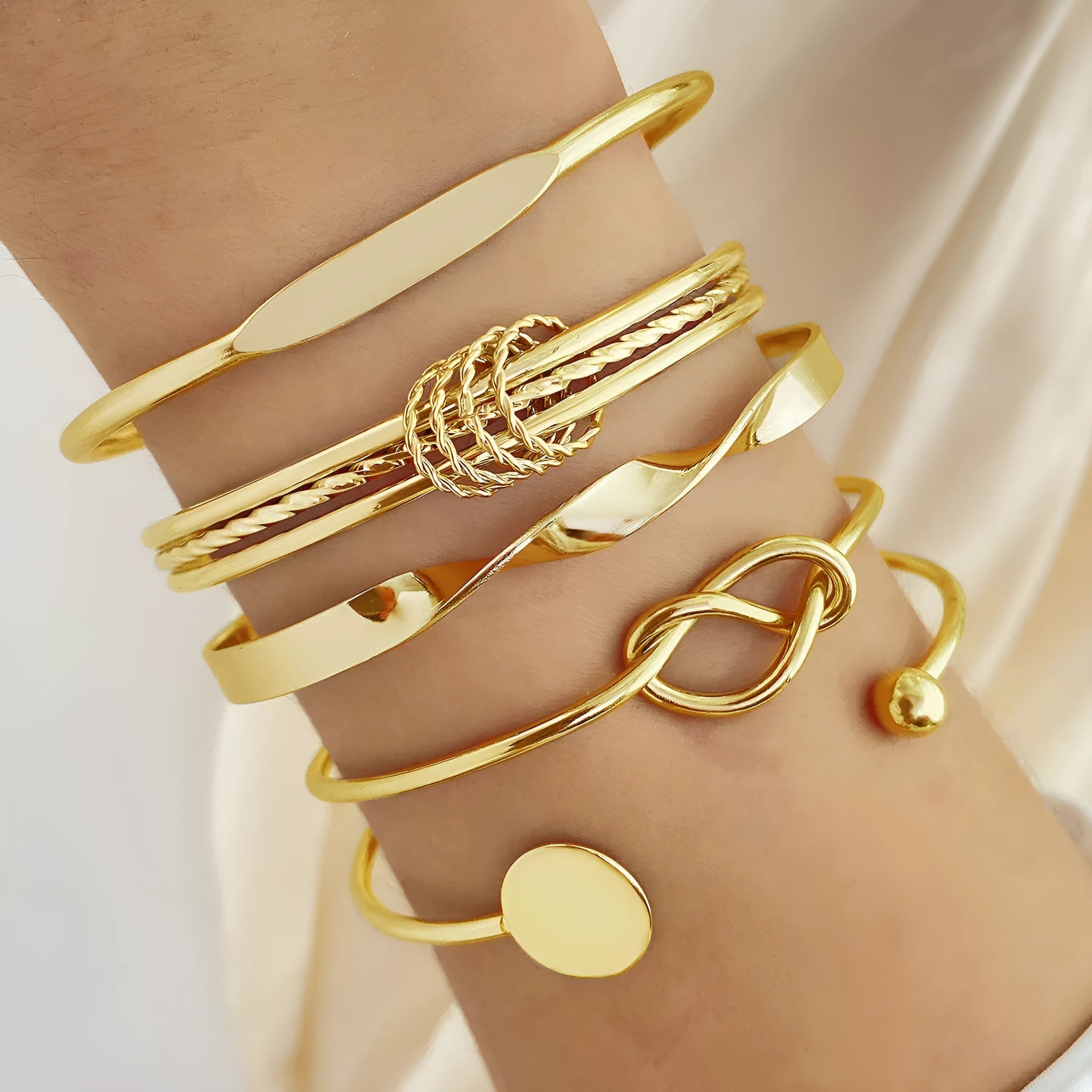 Set of five retro chain bracelets with geometric round, dot, and ring elements in electroplated alloy finish, HS1226 colour.