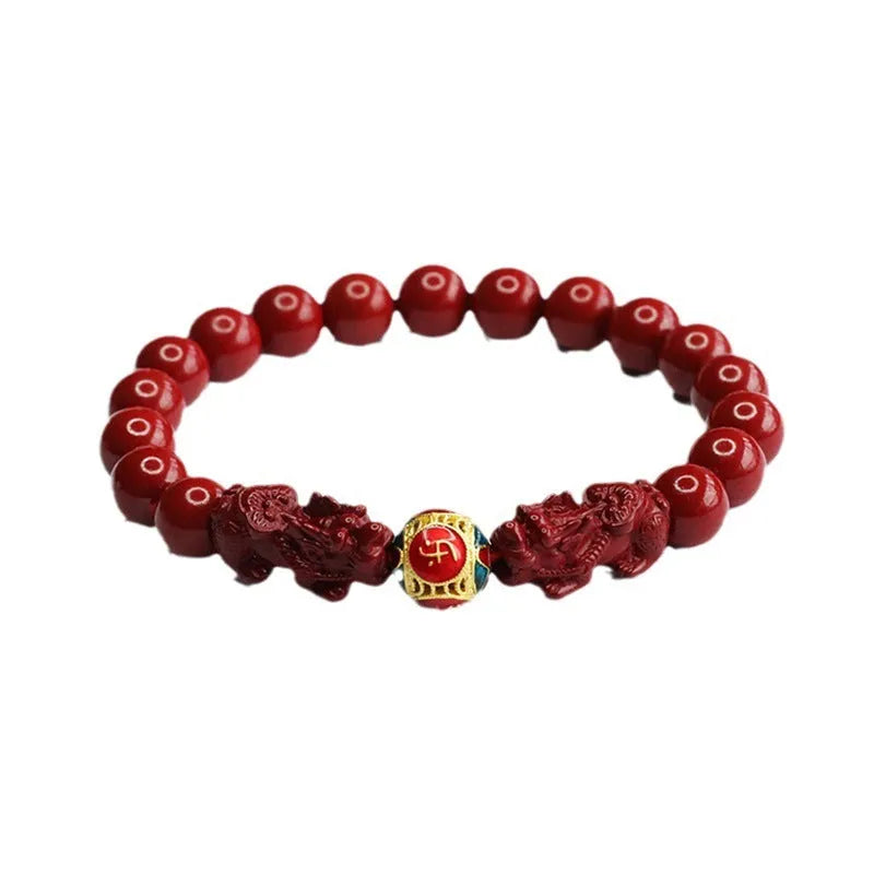 Close-up of a purple gold sand Cinnabar bracelet with carved Double Pixiu design, bead size 8mm.