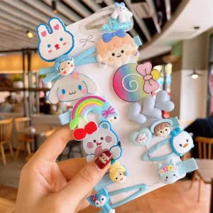 14-piece toddler hair clips set with rainbow barrettes, candy fruit, butterfly, and ice cream patterns on white background