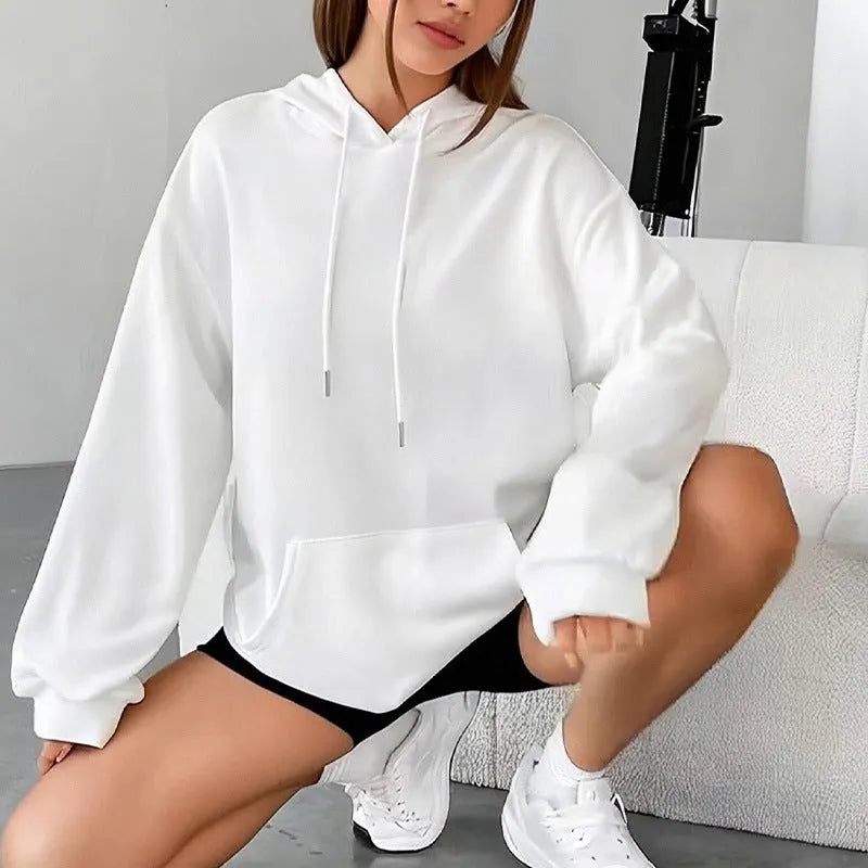Loose fit women's drawstring hoodie in a choice of multiple colours on a hanger.