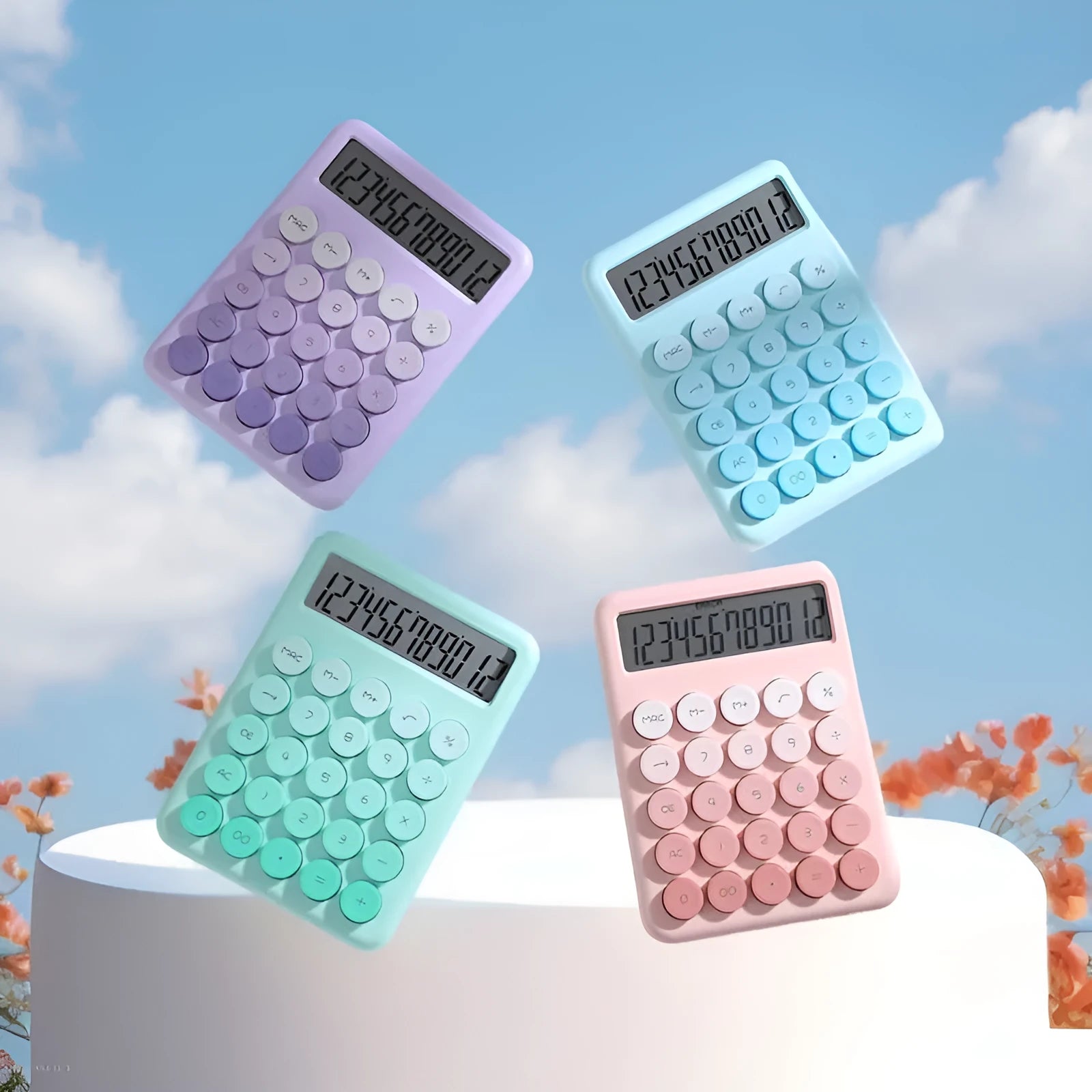 Gradient colour desk calculator in violet, cherry blossom pink, glacier blue, or mint green.
