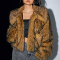 Artificial fox fur fashion coat with a fur collar and long sleeves in a short length.