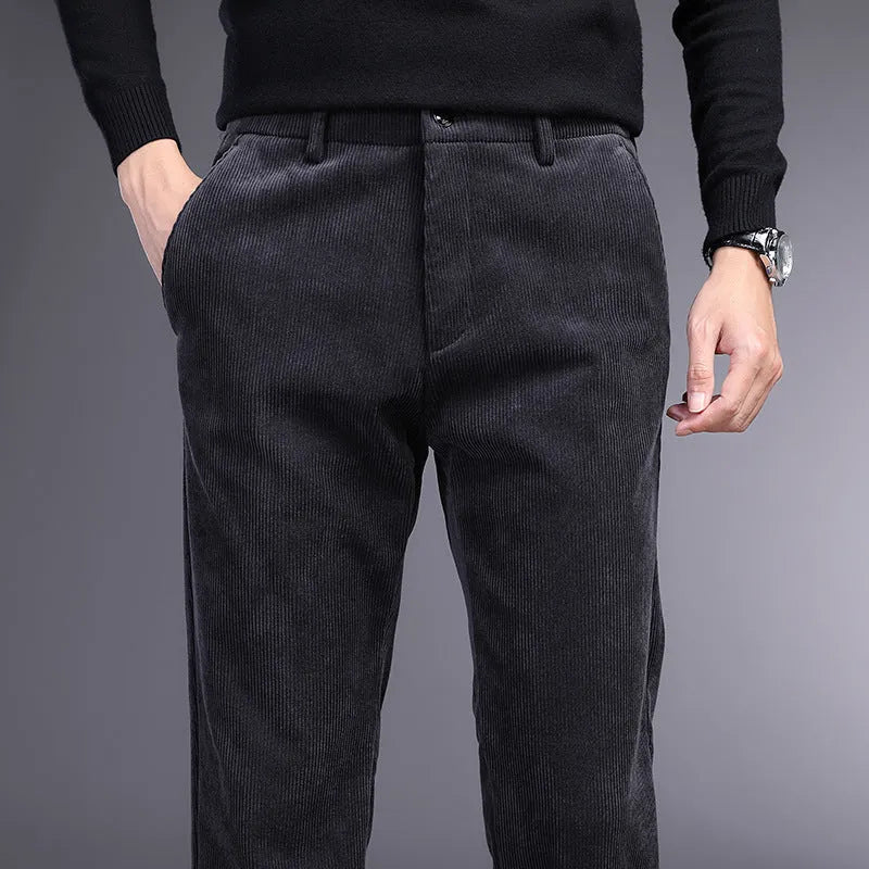 British retro style striped straight-leg trousers in a khaki colour, showing zip fly and classic cut.