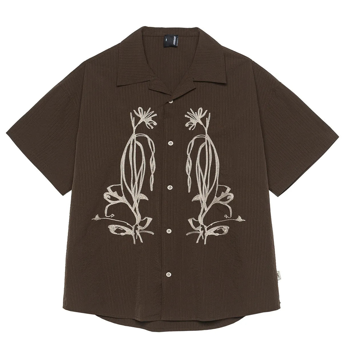Man wearing brown striped waterproof short sleeve shirt with Cuban collar for outdoor camping.