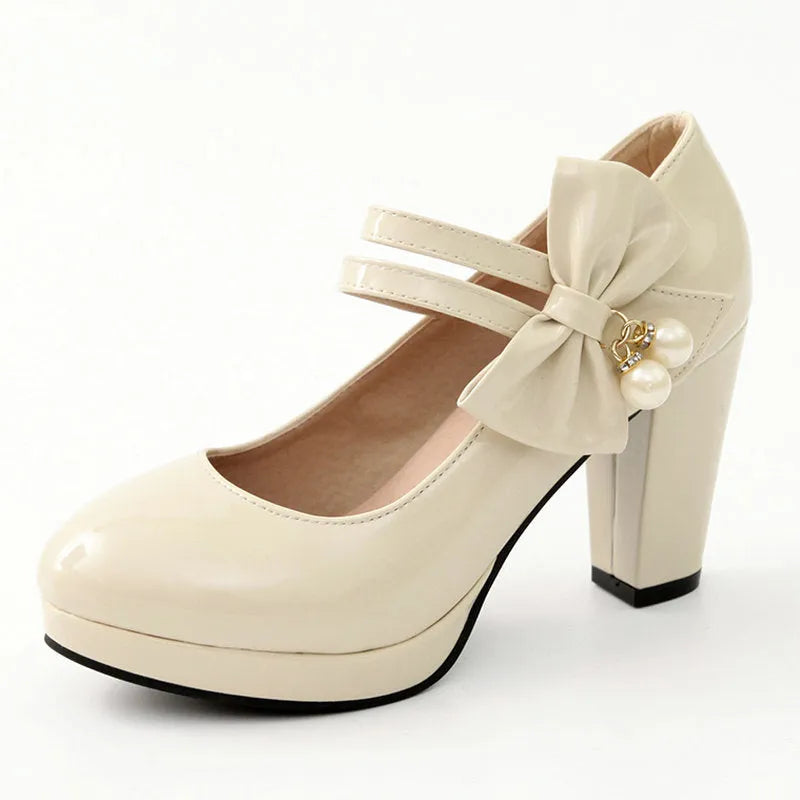 Women's waterproof platform shoes with chunky heels in red colour with round toe and buckle closure