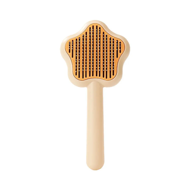Green self-cleaning cat grooming brush with stainless steel needle comb showing dimensions