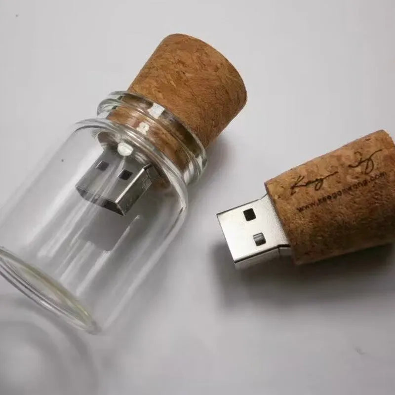 Wooden bottle-shaped USB flash drive on a keyring with transparent finish showing wood grain.