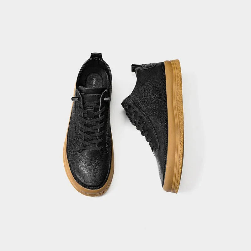Black men's leather lace-up casual shoes with a round toe and flat rubber sole.