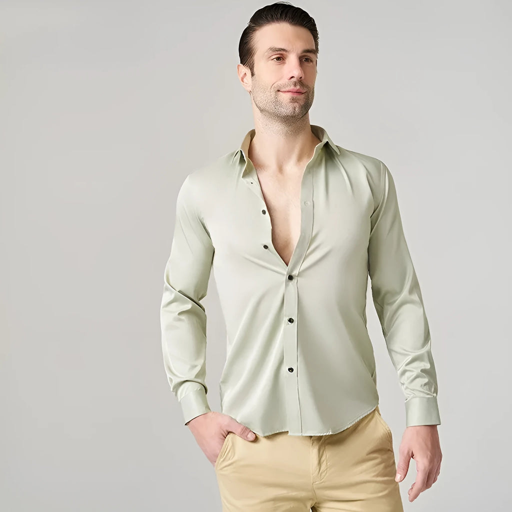 Men's long sleeve polyester work shirt on a hanger, shown in a light colour, demonstrating its professional style.