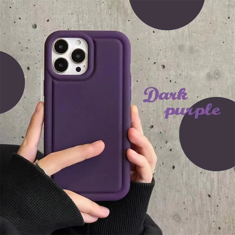 Silicone soft phone case for iPhone in black, showing rear cutout for camera and side buttons