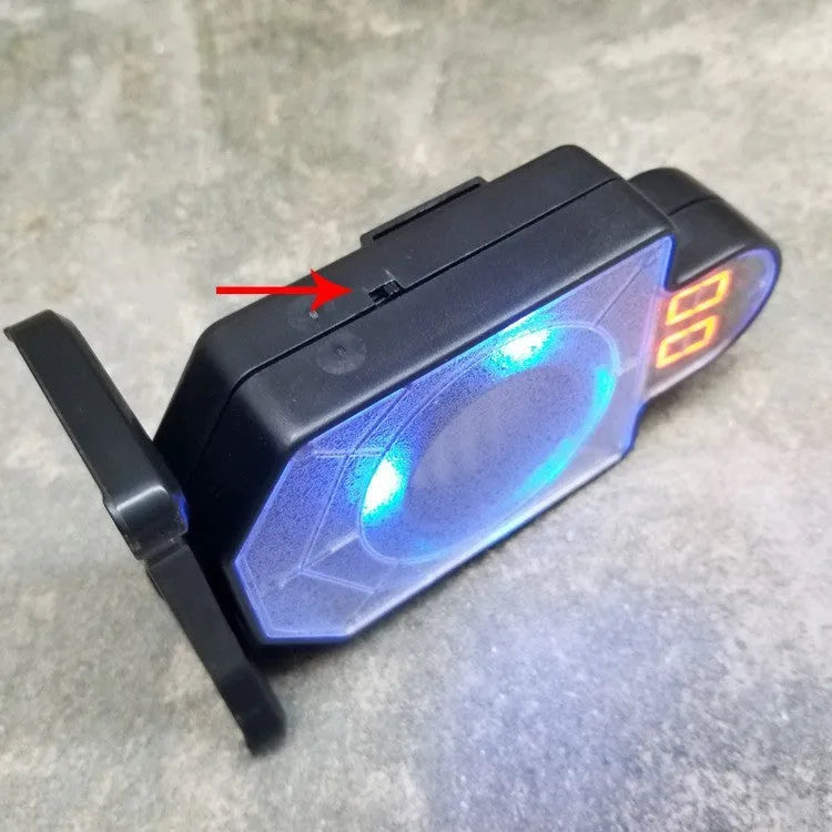 Laser target with light and sound effects in plastic casing, dimensions 9cm by 4.7cm by 12.8cm