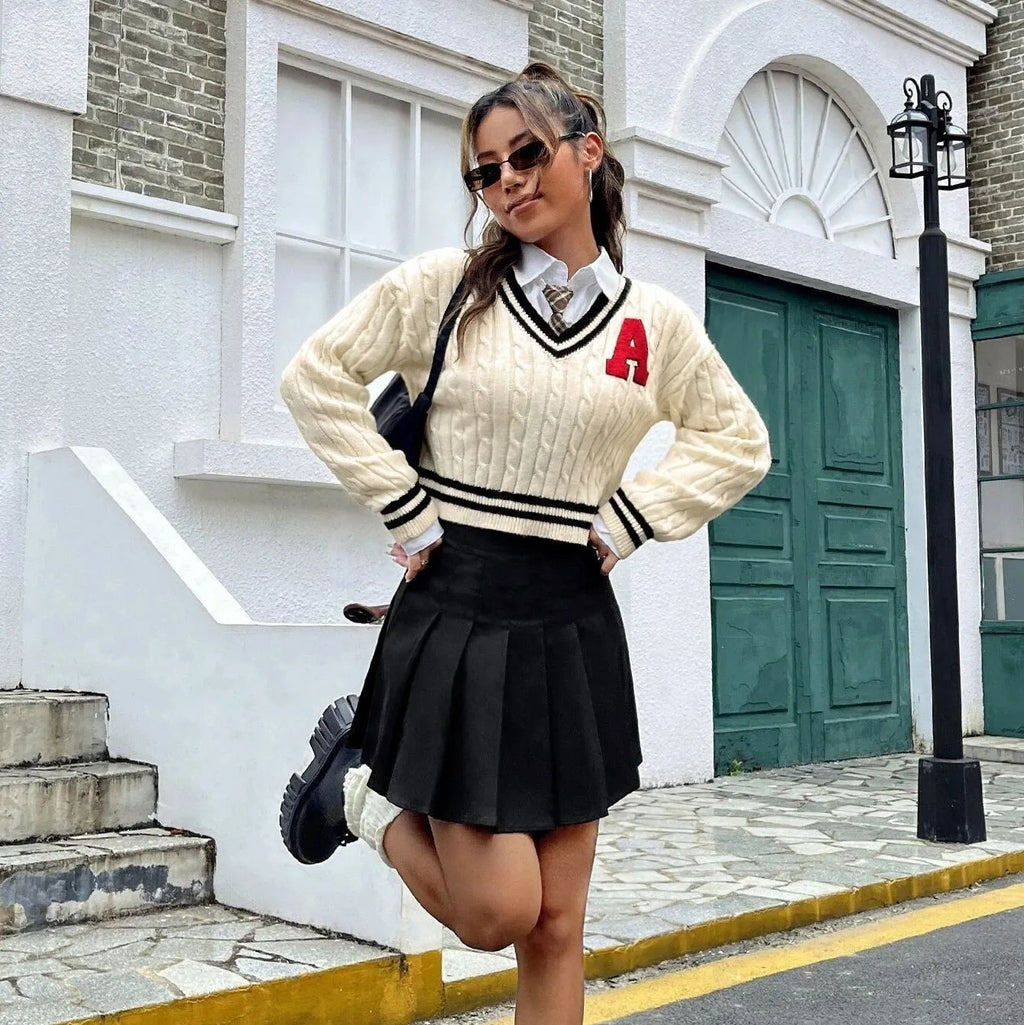 Milky white V-neck striped knitted shirt pullover for women with long sleeves and patch detail