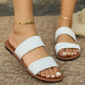 Women's plus size woven beach slippers in synthetic leather with PVC soles available in multiple colours