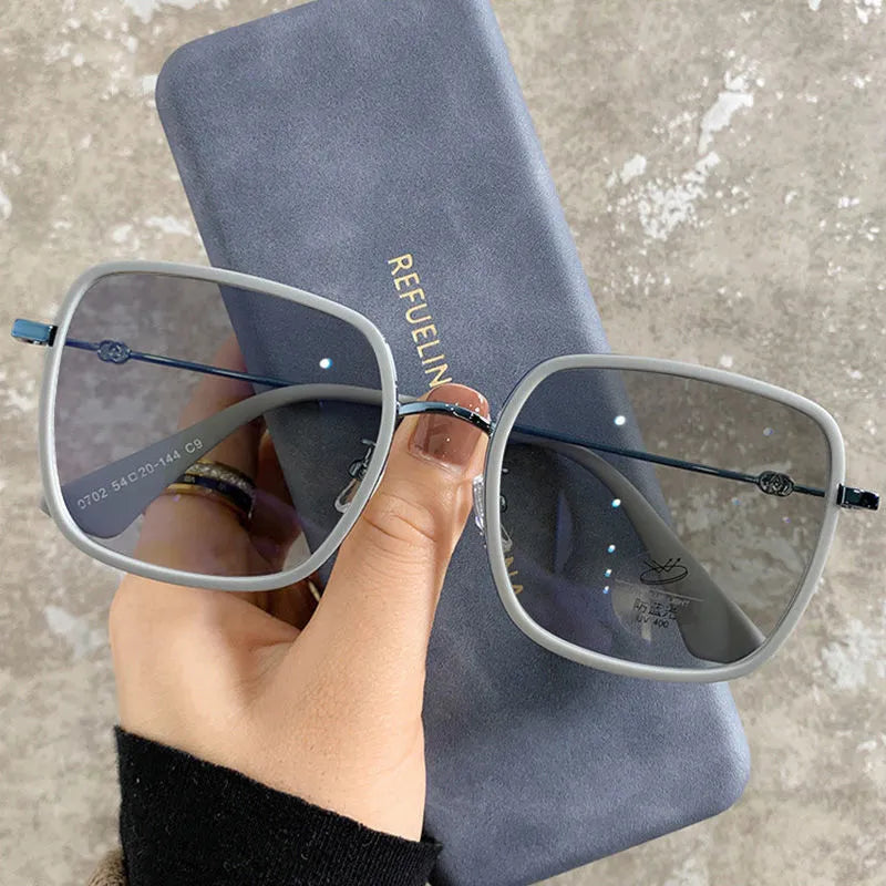 Photochromic myopia glasses with large frame, anti-blue light lens, and Black Gold frame colour options