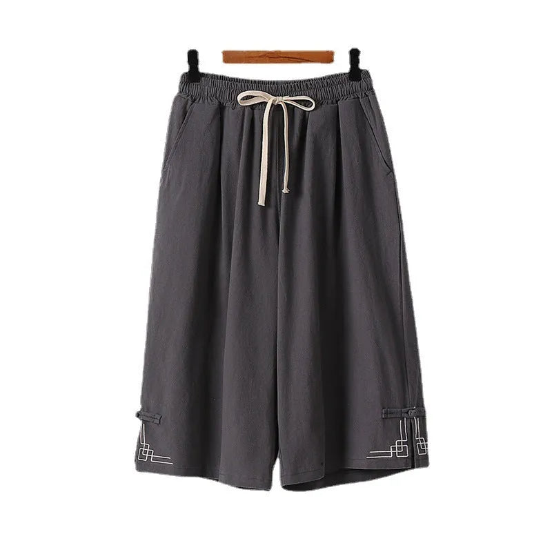Women's wide leg linen leisure shorts in cotton fabric with embroidery detail and elasticated waistband