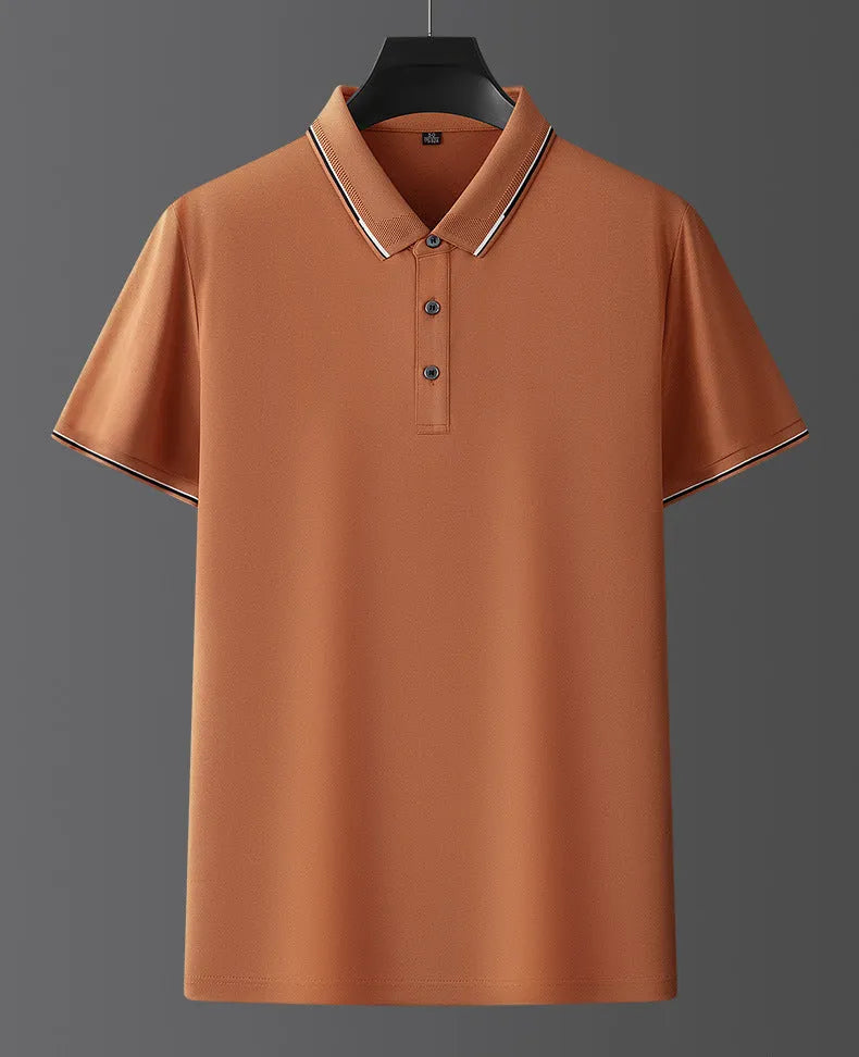 Man wearing a pure colour mulberry silk short sleeve shirt in a light summer setting.