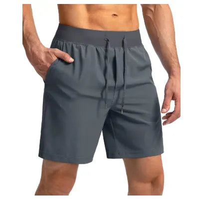 Men's loose nylon quick-dry sports shorts in black, side view, summer training wear