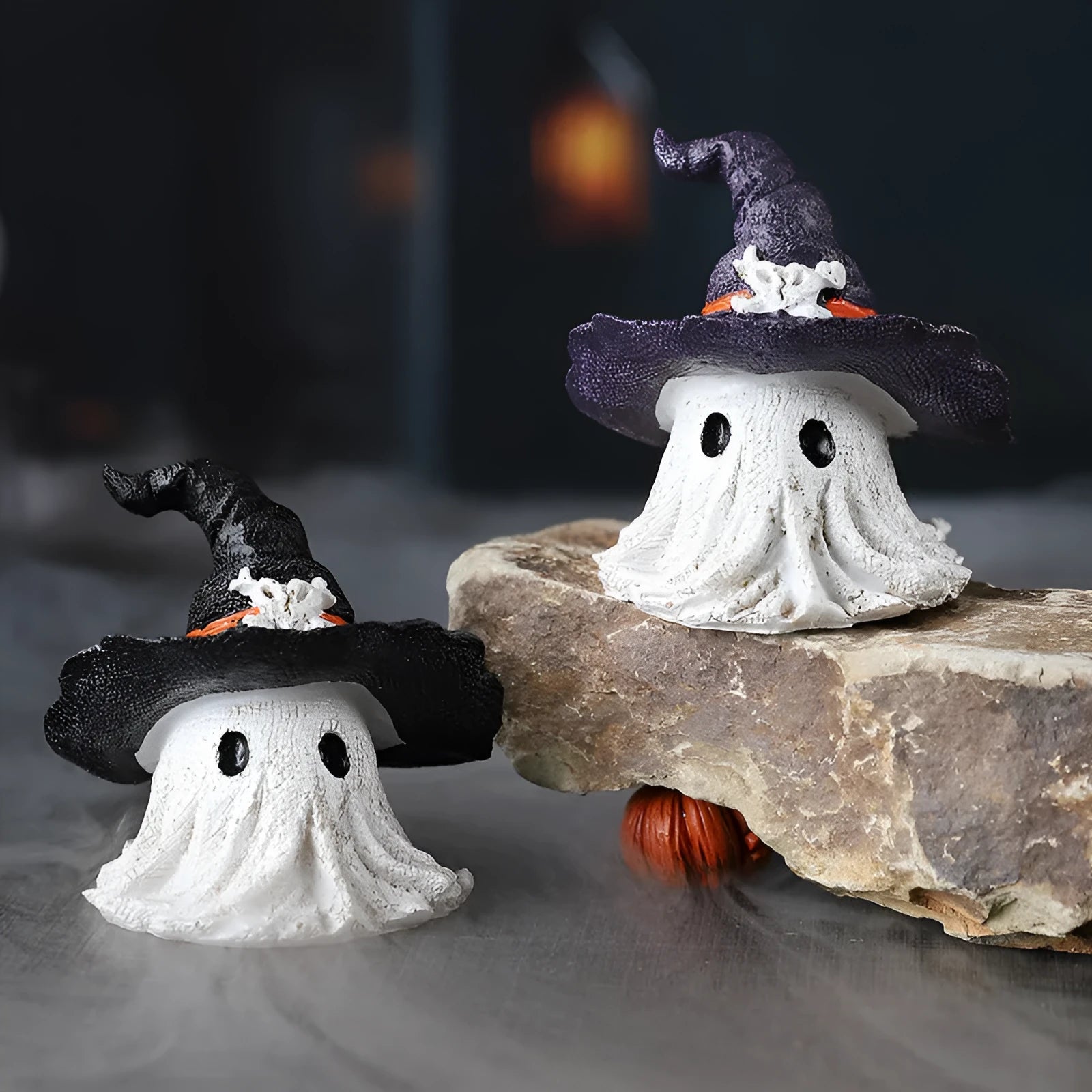 Resin Halloween wizard hat ghost ornament in black or purple colours for seasonal decoration