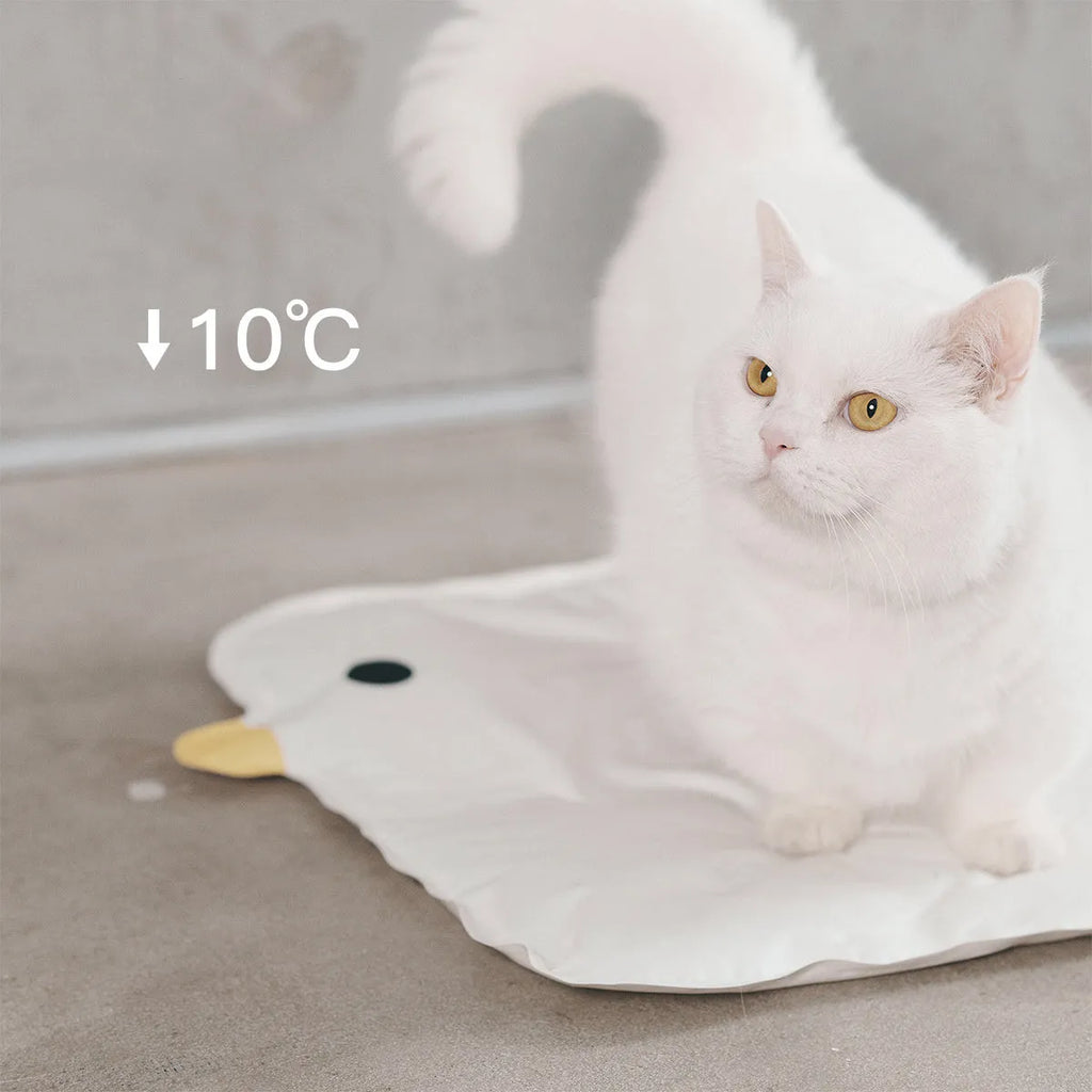 Washable chick-shaped pet cooling mat measuring 45cm by 45cm with composite cloth construction