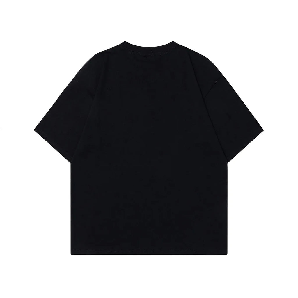 Men's grey loose-fit cotton t-shirt featuring a retro character design print on the chest.