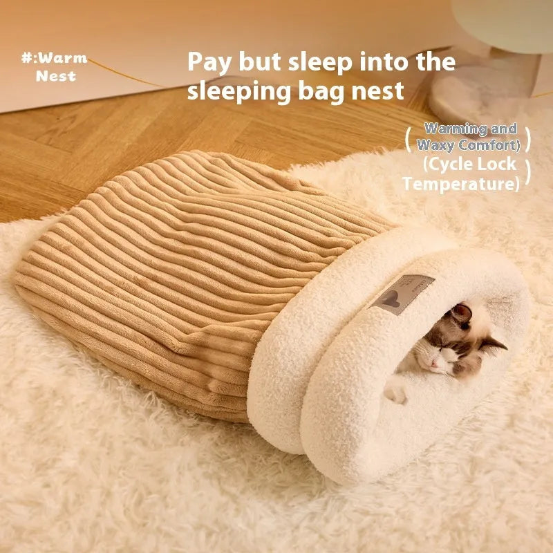 Brown semi-enclosed plush pet sleeping bag or cat nest bed on a wooden floor.