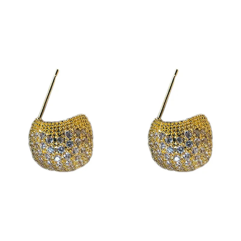 Geometric drop-shaped earrings with full diamond detailing, spherical elements, and little golden beans motif in gold or white colour