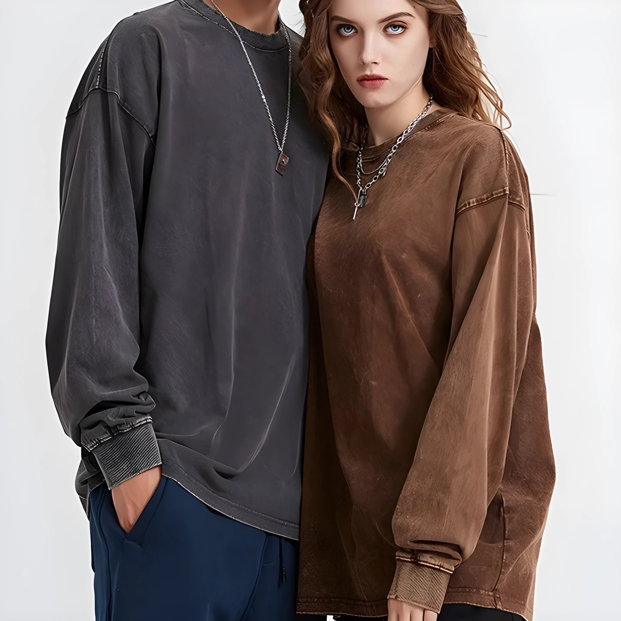 Man wearing a loose-fit, long-sleeve batik-effect cotton pullover in a washed vintage style.