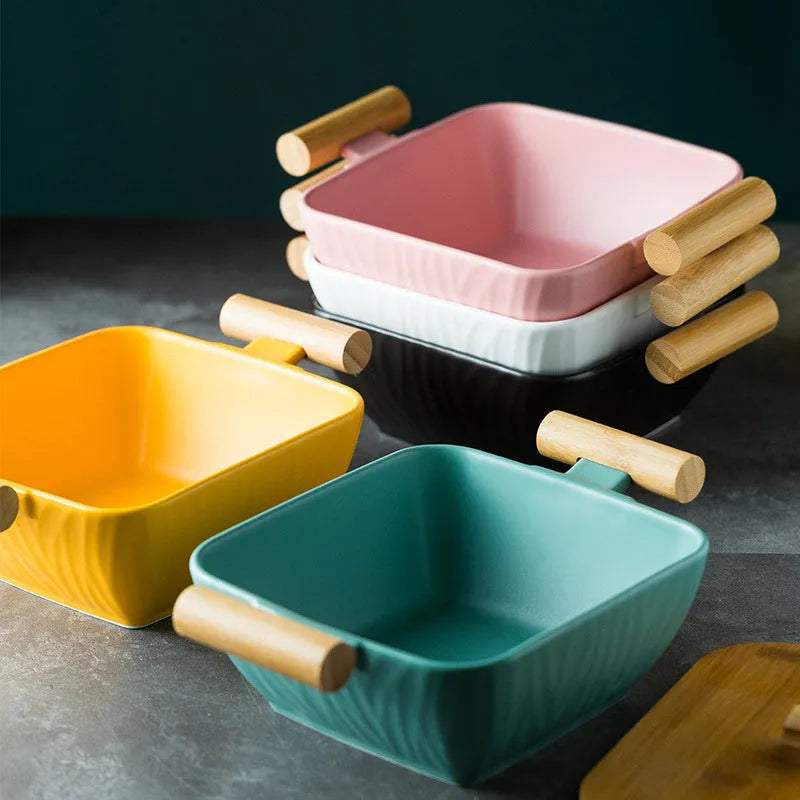 Modern ceramic bowl with irregular shape and matching lid in four colour options