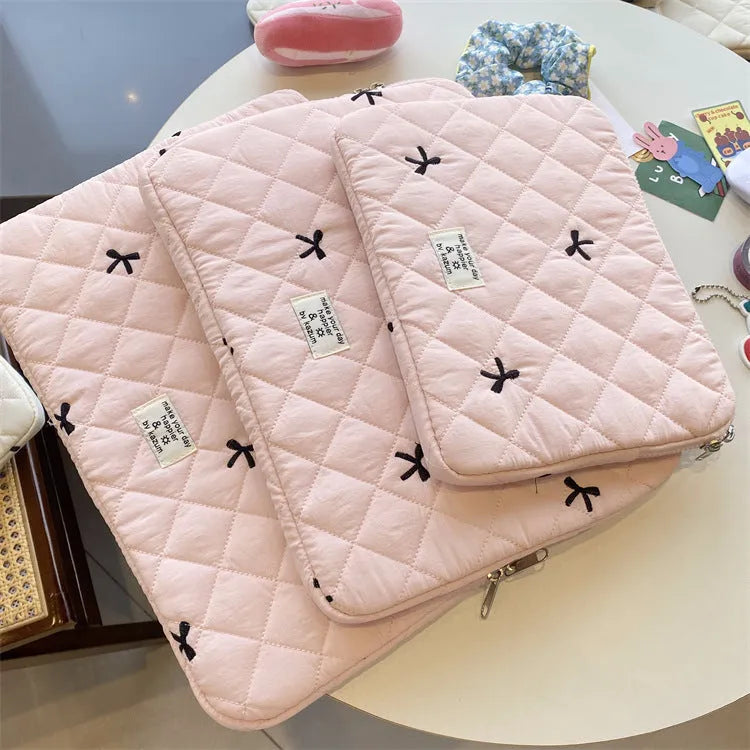 Rhombus embroidered bow notebook storage bag in nylon with device-specific sizing options