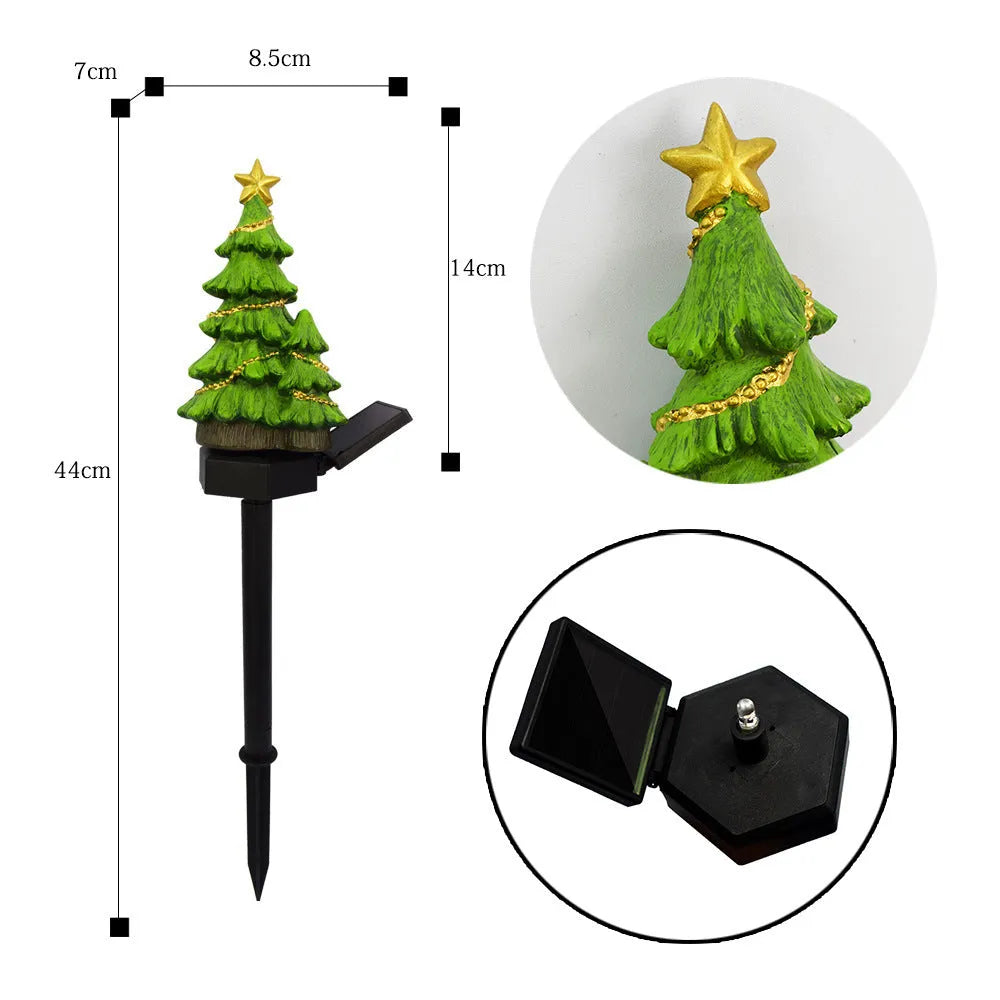 Solar powered Christmas tree shaped ground plugged lawn lamp with resin body and solar panel for outdoor garden decoration
