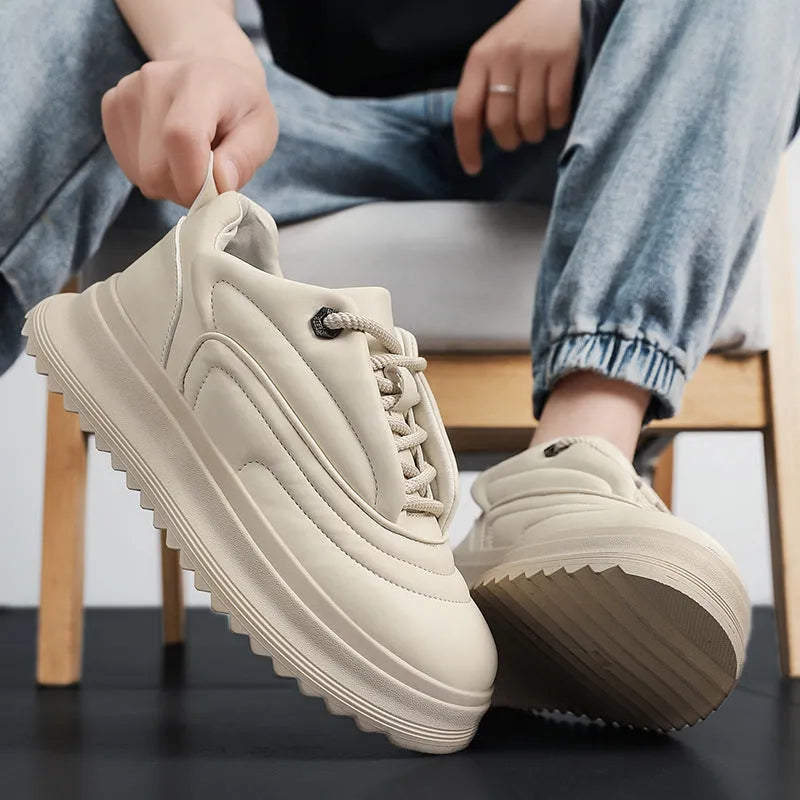 Unisex casual leather trainers with a thick platform sole in black, white, and khaki colour options.