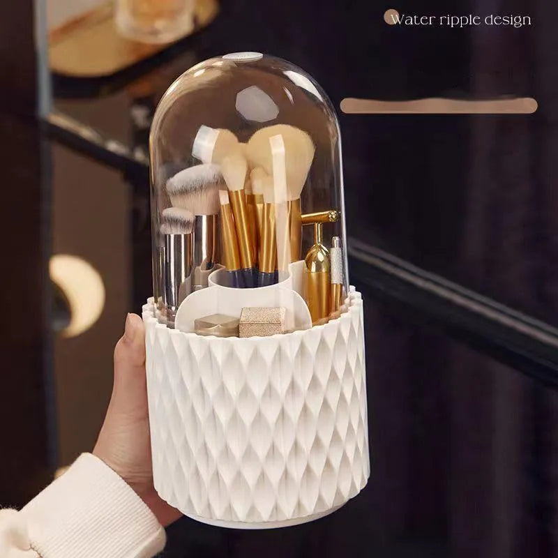 White acrylic rotating makeup brush holder with transparent dust cover showing split storage compartments